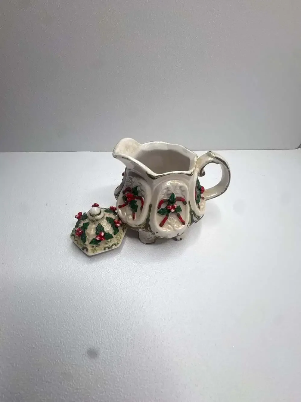 Christmas Holiday Holly and Candy Cane Embossed Ceramic Creamer with Lid